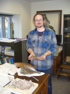 Dr. Nicholas Pyenson with rare fossil whale jaw