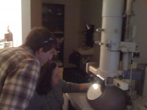 Carter Mavromatis '12 and Dr. Loesser observing "Fhageblaster", a phage isolated by Carter near his hometown of Virginia Beach