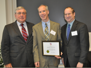Dr. Alex Werth joined by VFIC Chairman Robert Woltz (left) and Hiter Harris III (right) following the presentation of the 2011 Harris Award. 