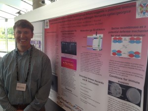 Greg Robertson '12 with his research poster