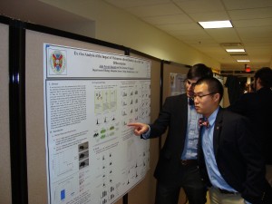 Jay Brandt '15 presenting his research on immune responses to melanoma to James Lau'17