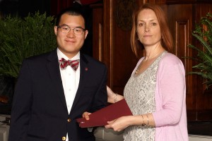 James Lau '17 receives the Sophomore Academic Excellence Award from Associate Dean for Academic Success Christa Fye