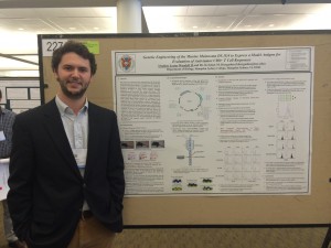Stephen Woodall '15 and his award-winning poster entitled "Genetic Engineering of the Murine Melanoma D5.1G4 to Express a Model Antigen for Evaluation of Anti-tumor CD8+ T Cell Responses"