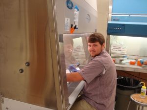 Cole Johnson '19 setting up a tumor cell/extracellular matrix adhesion assay!